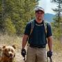 Photo of Mark S. with his playful Labrador, Rex